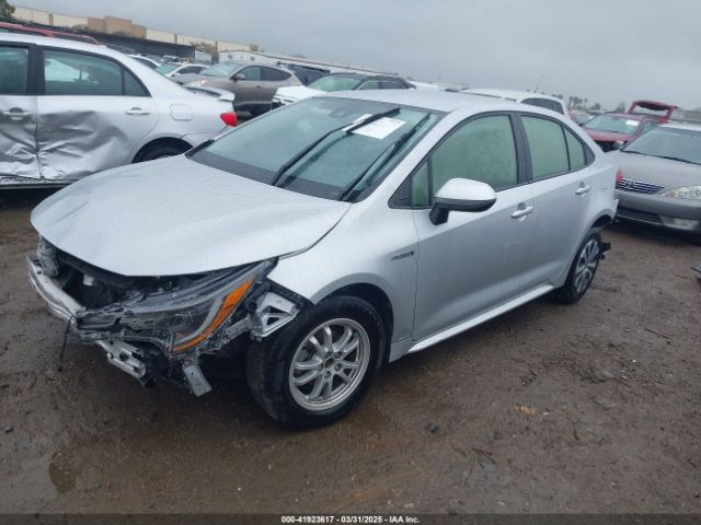 JTDEAMDE6MJ000987 Toyota Corolla Hybrid Le