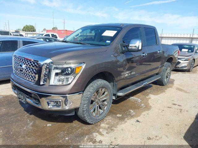 1N6AA1E54KN519969 Nissan Titan Sl