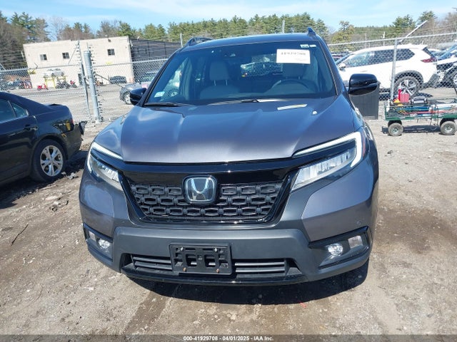 5FNYF8H08MB011467 Honda Passport Awd Elite