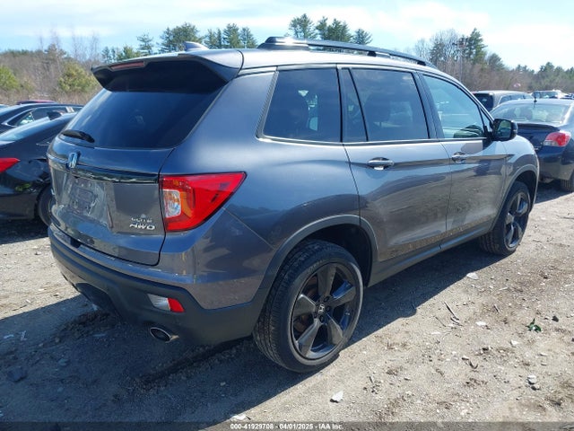 5FNYF8H08MB011467 Honda Passport Awd Elite