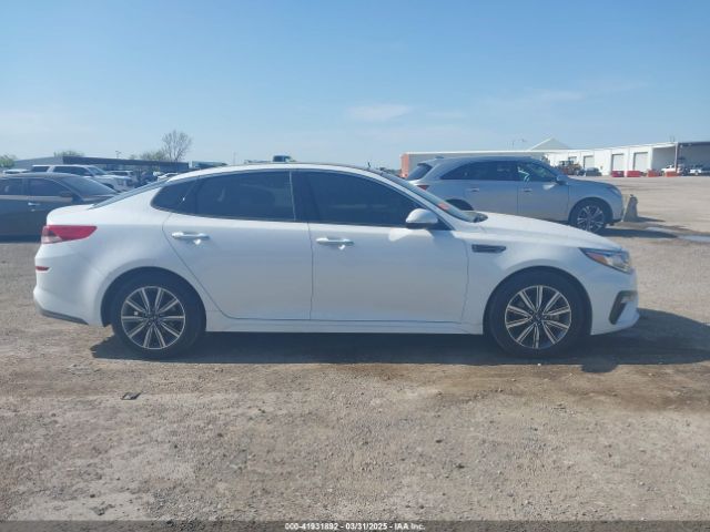 5XXGT4L39KG298990 KIA Optima Lx