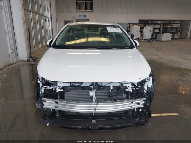 Toyota Corolla Hybrid Le 2024 JTDBCMFE4R3043391 Image 13