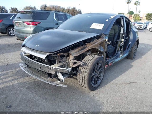 2025 TESLA MODEL Y 7SAYGDED9SF304730 Photo 1