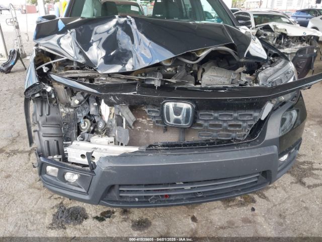 5FNYF7H29KB010241 Honda Passport Sport