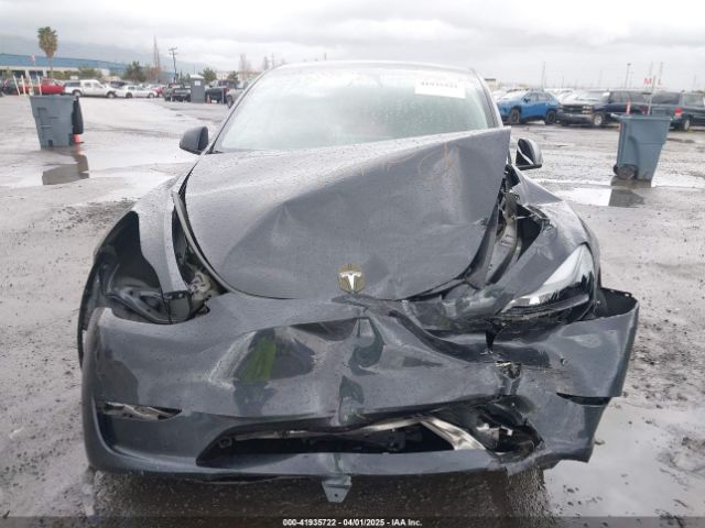2024 TESLA MODEL Y 7SAYGDED8RF131647 Photo 5