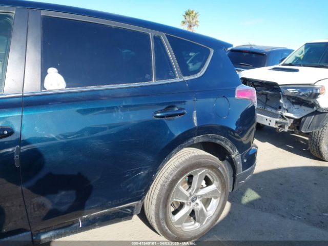 JTMZFREV1JJ183872 Toyota RAV4 LE