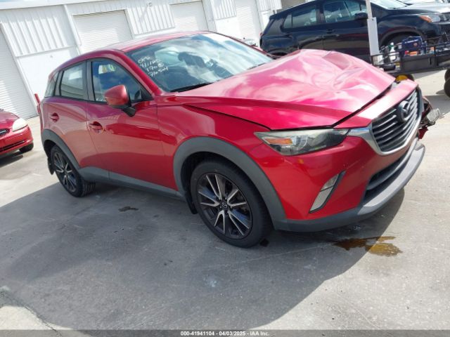 JM1DKDC7XJ0318219 Mazda Cx-3 Touring