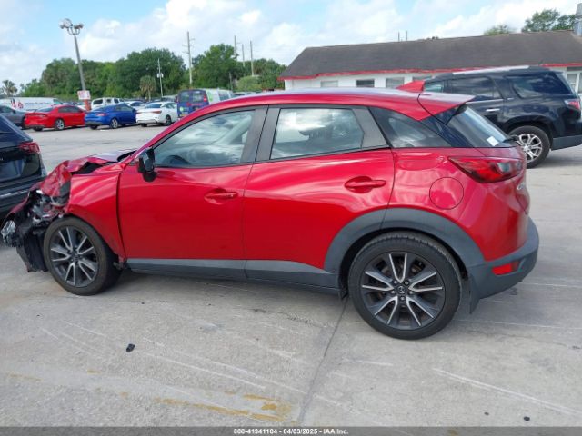 JM1DKDC7XJ0318219 Mazda Cx-3 Touring