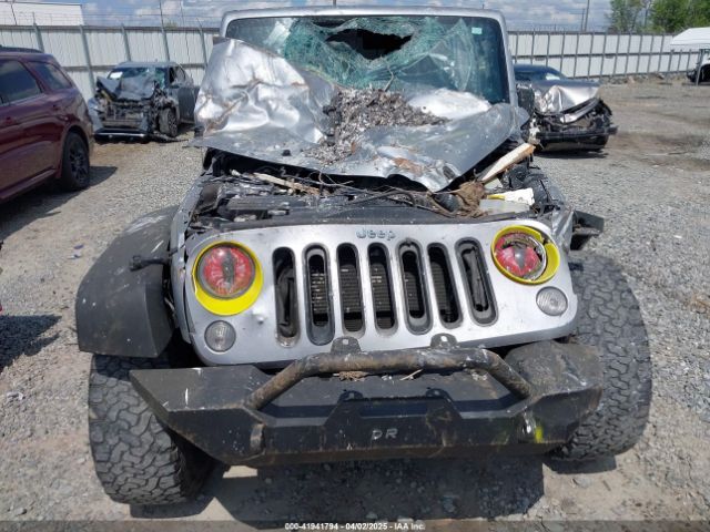 1C4BJWDG0EL263918 Jeep Wrangler Unlimited Sport
