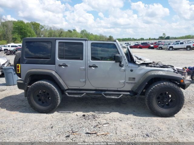 1C4BJWDG0EL263918 Jeep Wrangler Unlimited Sport