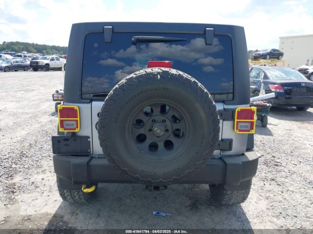 1C4BJWDG0EL263918 Jeep Wrangler Unlimited Sport