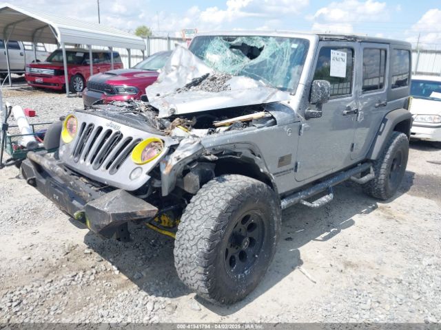 1C4BJWDG0EL263918 Jeep Wrangler Unlimited Sport