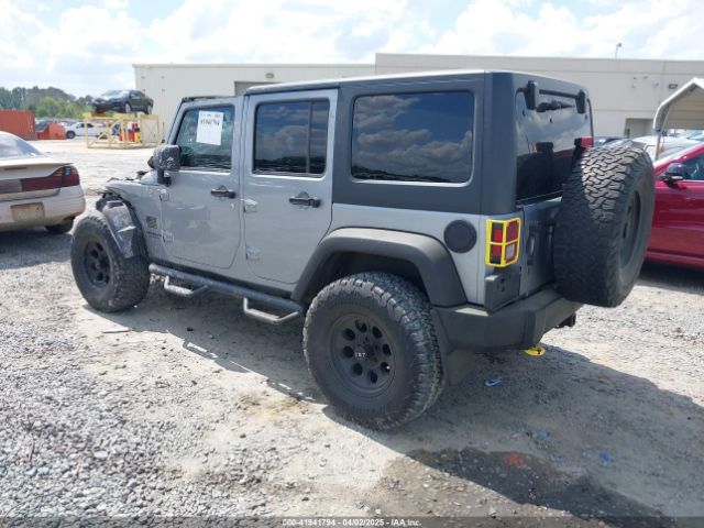 1C4BJWDG0EL263918 Jeep Wrangler Unlimited Sport