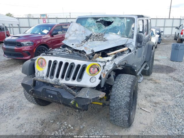 1C4BJWDG0EL263918 Jeep Wrangler Unlimited Sport