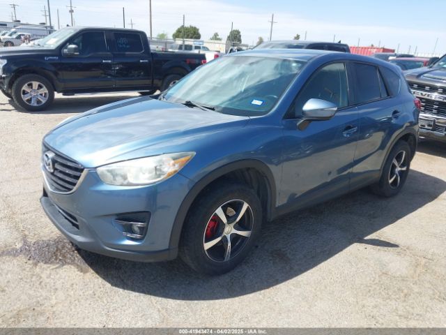 JM3KE2CY9G0828671 Mazda Cx-5 Touring