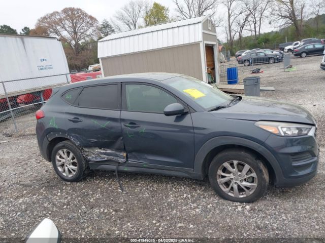 KM8J23A4XKU985562 Hyundai TUCSON SE