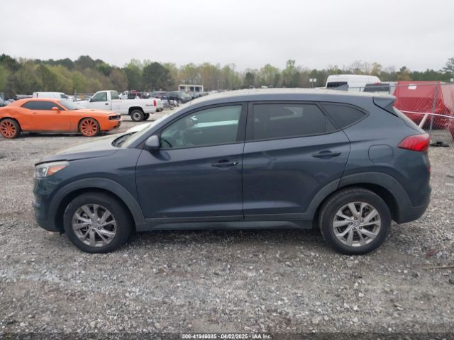 KM8J23A4XKU985562 Hyundai TUCSON SE
