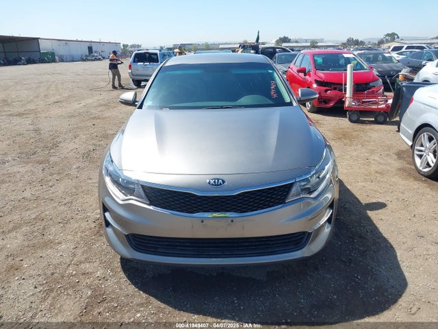 5XXGT4L39GG116566 KIA Optima Lx