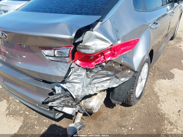 5XXGT4L39GG116566 KIA Optima Lx