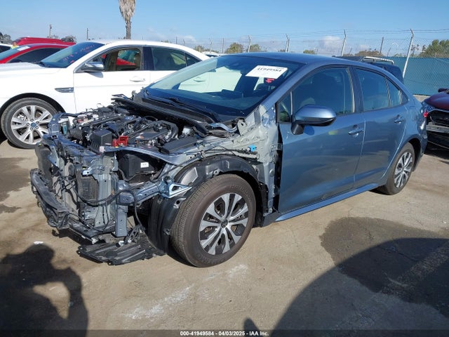 Toyota Corolla Hybrid Le 2021 JTDEAMDEXMJ002757 Image 2