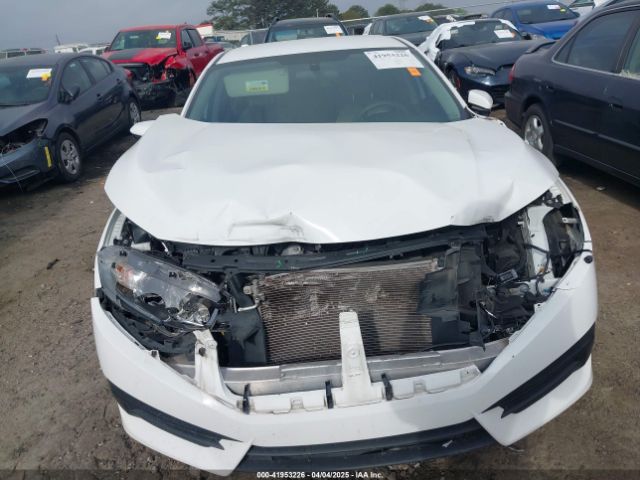 2HGFC2F58JH566566 Honda Civic Lx