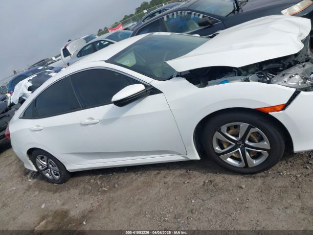 2HGFC2F58JH566566 Honda Civic Lx