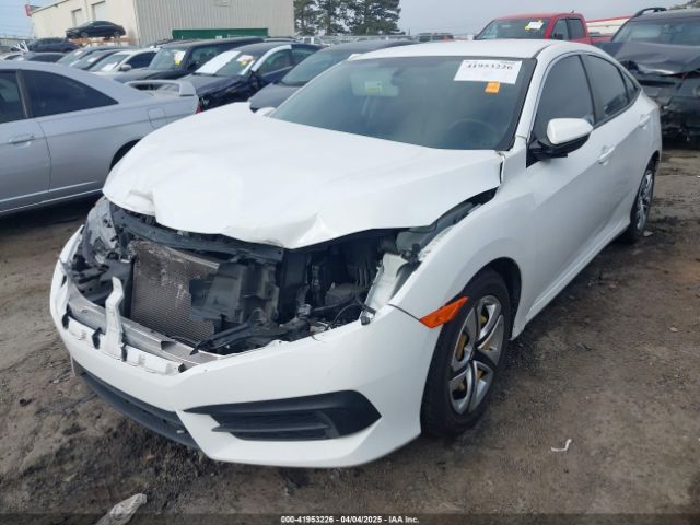 2HGFC2F58JH566566 Honda Civic Lx
