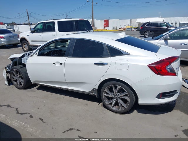 JHMFC1F90KX008282 Honda Civic Touring
