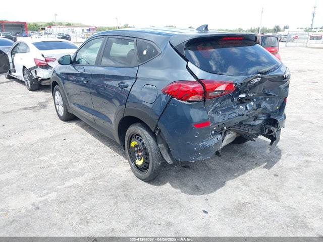 KM8J23A4XKU881881 Hyundai TUCSON SE