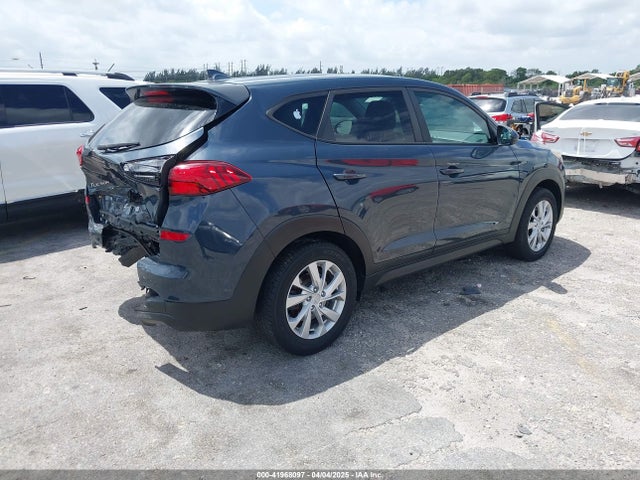 KM8J23A4XKU881881 Hyundai TUCSON SE