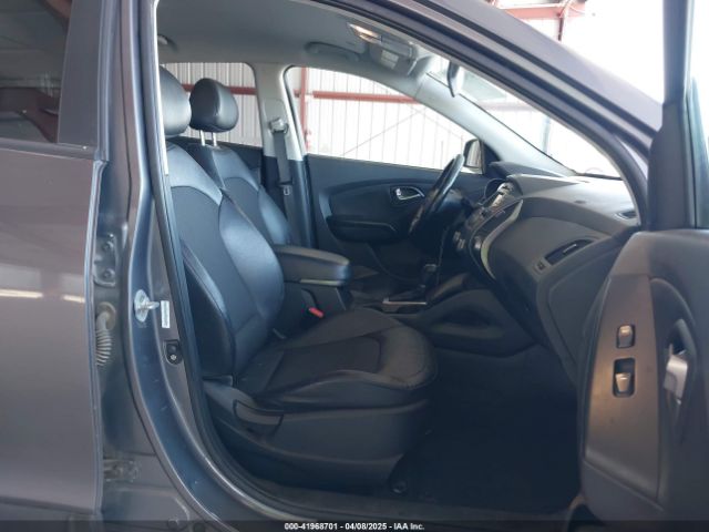 KM8JU3AG1EU918664 Hyundai TUCSON SE