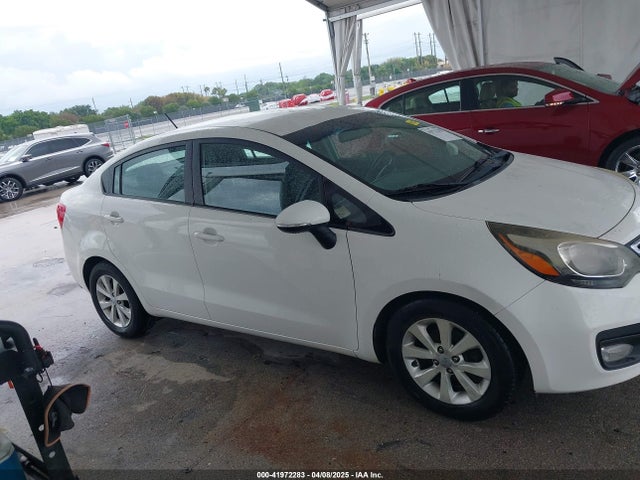 KNADN4A38E6339206 KIA RIO EX