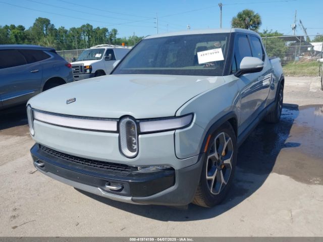 2022 RIVIAN R1T 7FCTGAAA2NN006053 Photo 1