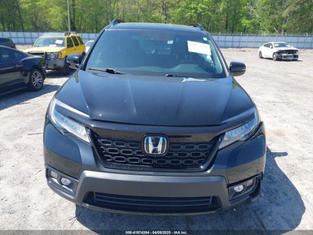 5FNYF8H03KB003970 Honda Passport Elite