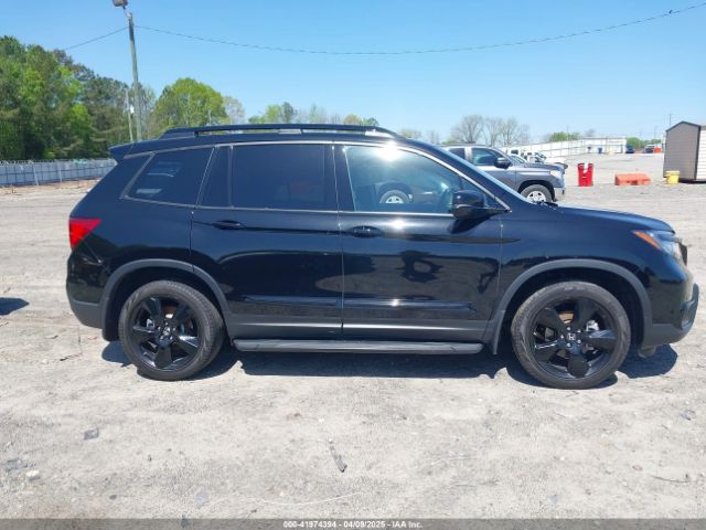 5FNYF8H03KB003970 Honda Passport Elite