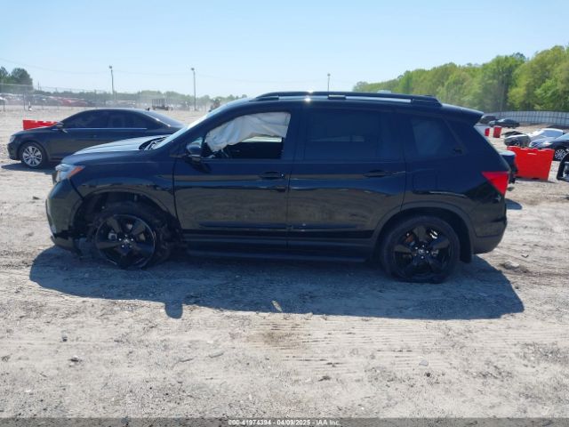 5FNYF8H03KB003970 Honda Passport Elite