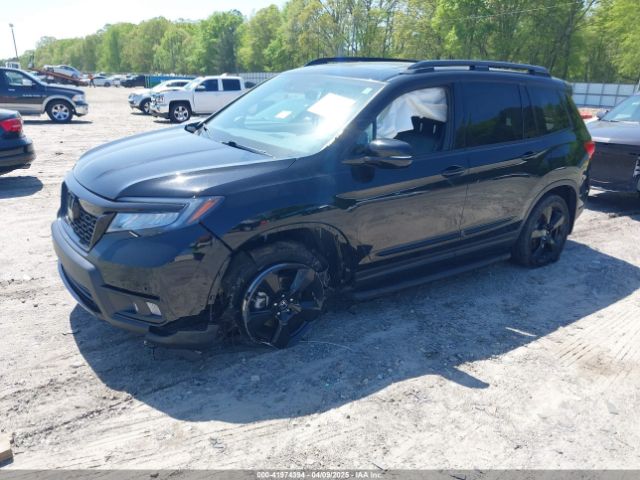 5FNYF8H03KB003970 Honda Passport Elite
