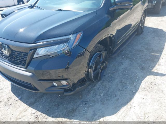 5FNYF8H03KB003970 Honda Passport Elite