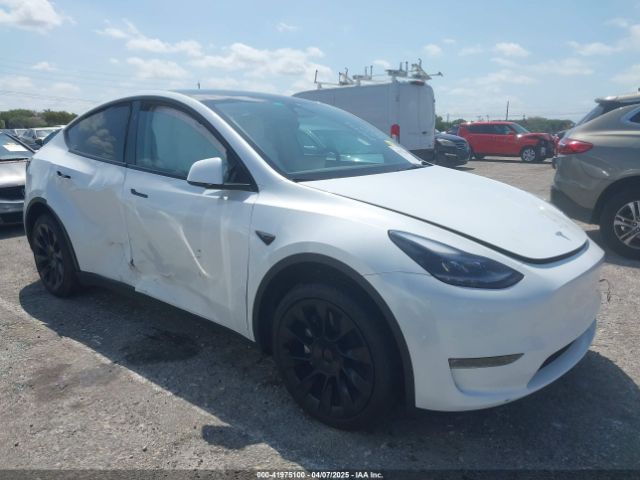 2024 TESLA MODEL Y 7SAYGDEE6RA292939 Photo 0