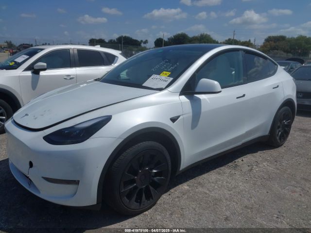 2024 TESLA MODEL Y 7SAYGDEE6RA292939 Photo 1