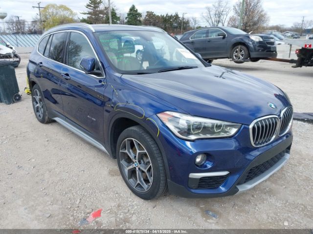 2017 BMW X1 WBXHT3C39H5F70584