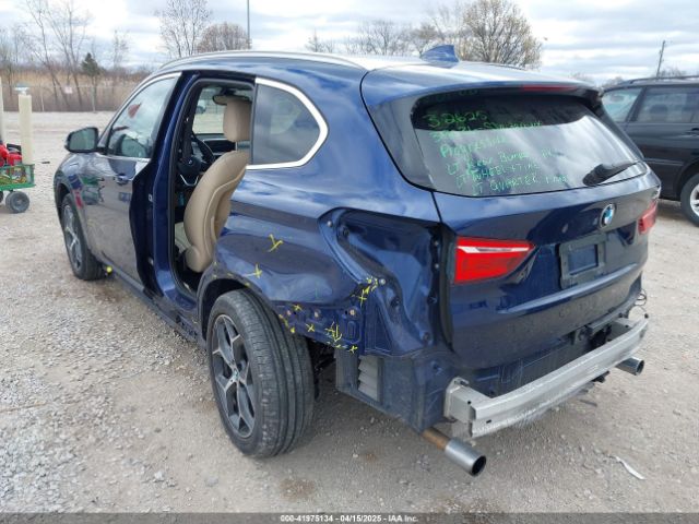 2017 BMW X1 WBXHT3C39H5F70584 Photo 2