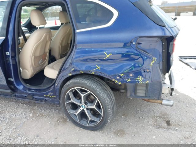 2017 BMW X1 WBXHT3C39H5F70584 Photo 5