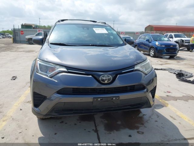 JTMZFREV7JJ724116 Toyota RAV4 LE