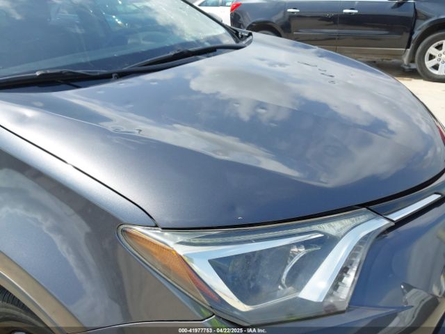 JTMZFREV7JJ724116 Toyota RAV4 LE