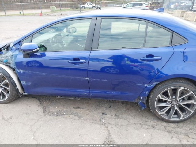 JTDP4MCE9MJ067942 Toyota COROLLA SE