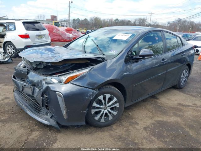 JTDL9RFU2K3000147 Toyota Prius Le