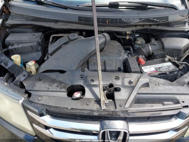 5FNRL5H94EB057499 Honda Odyssey Touring/touring Elite