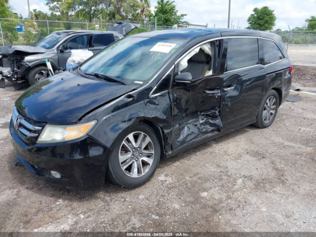 5FNRL5H94EB057499 Honda Odyssey Touring/touring Elite