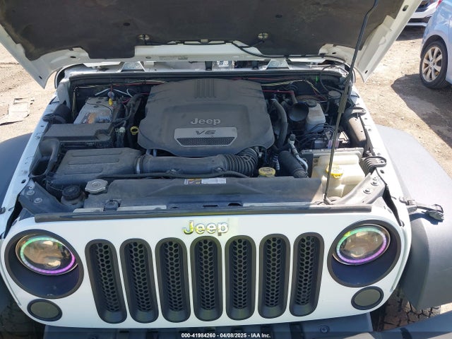 1C4BJWDG8EL144417 Jeep Wrangler Unlimited Sport